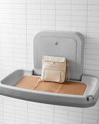 Skip Hop Travel Baby Changing Pad with Easy-Clean Surface, Covers Public Changing Stations, Wipes Pocket, Diaper Storage, Disposable Bag Dispenser and Magnetic Wipes Pocket, Clean Slate, Oat - Image 2